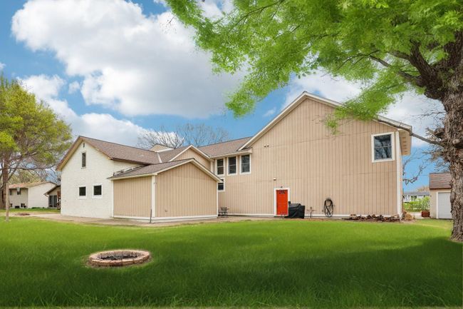 Just shy of an acre - enjoy flat lot, add a pool or relax around a fire! | Image 32
