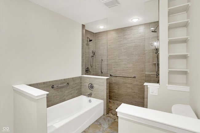 Accessible shower with dual shower heads. | Image 38