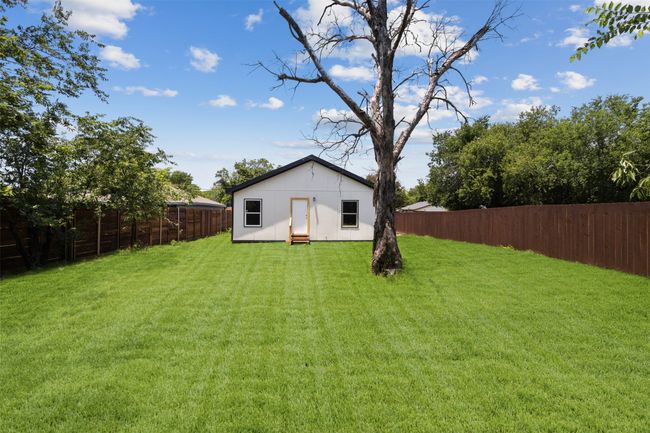 Back of property featuring a fenced backyard | Image 27