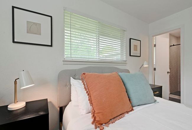 The primary suite comes with its own remodeled ensuite bathroom. | Image 22