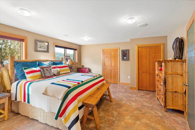 Lower level bedroom. | Image 74