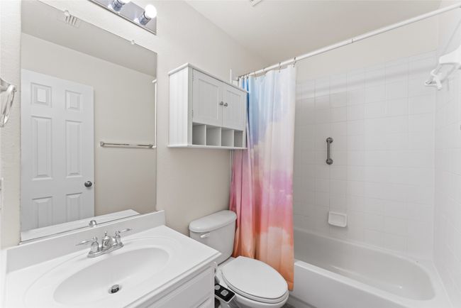 Full bath with vanity and shower / bathtub combination with curtain | Image 33