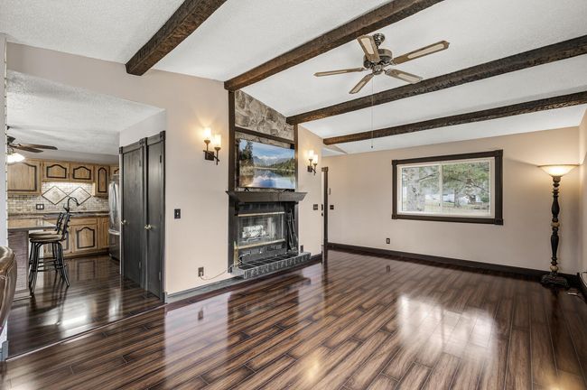 The Vaulted Ceilings draw your eye to the beautiful beams that match the new Hardwood floors! | Image 4