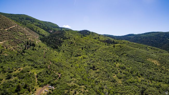 Mountain view with a view of trees | Image 11