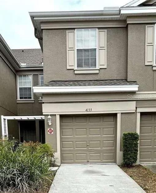 4133 Bismarck Palm Dr, TAMPA, FL, 33610-9038 | Card Image