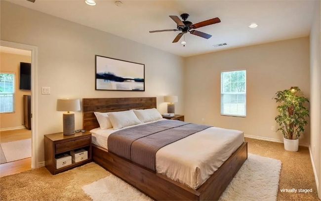 Bedroom with light colored carpet, recessed lighting, and a ceiling fan | Image 20