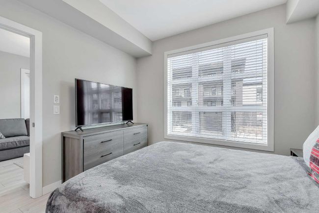 205 - 383 Smith Street Nw, Home with 2 bedrooms, 2 bathrooms and 1 parking in Calgary AB | Image 13