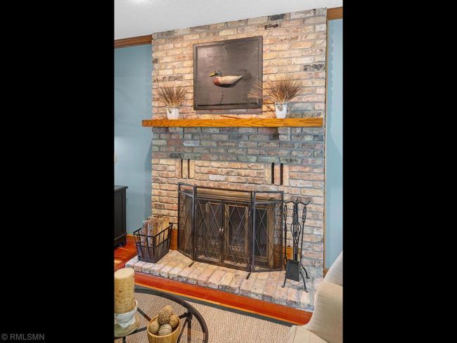 1 of 2 cozy wood burning fireplaces | Image 21