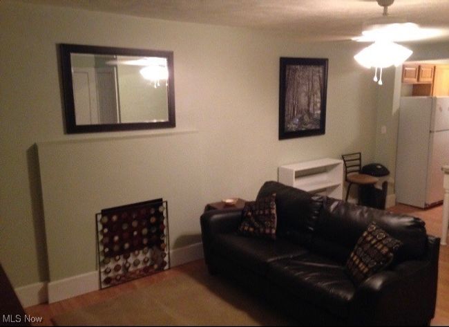 View of living room | Image 7