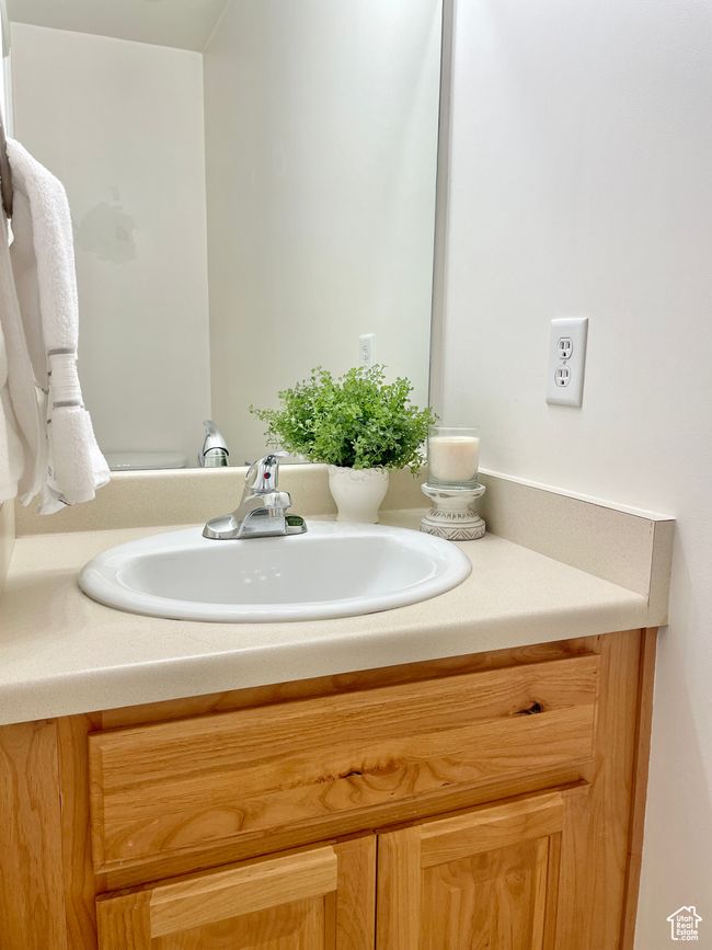 Bathroom featuring vanity | Image 11