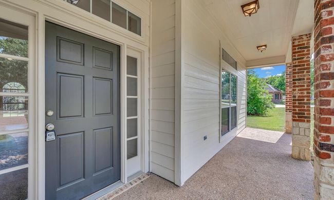 Property entrance with pretty covered front porch | Image 4