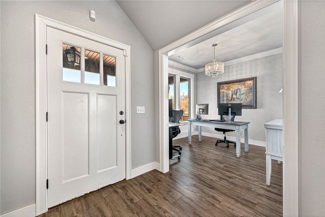 Beautiful front entry door with formal dining/office just inside. | Image 9