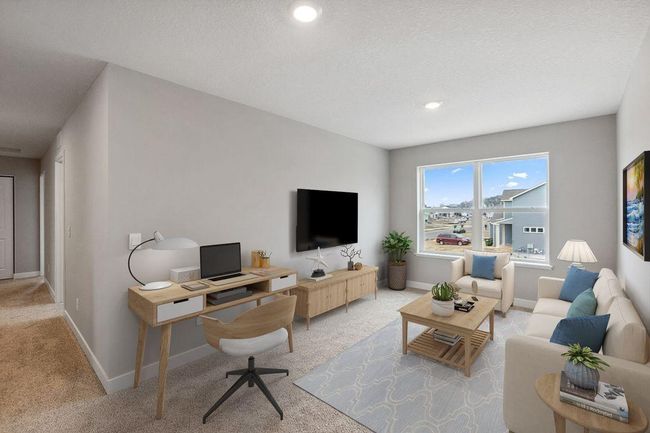 The upper level loft is a great space to unwind, read books or watch TV. Model photos. Options and colors will vary. | Image 26