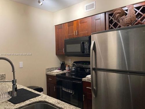 apt-206-2880 N Oakland Forest Dr, Oakland Park, FL, 33309-6421 | Card Image