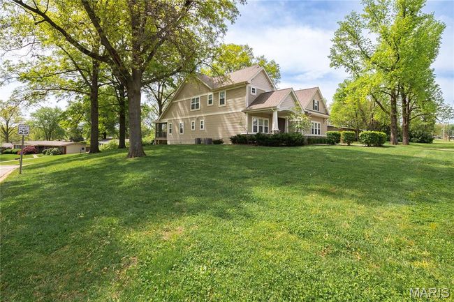 View of side of property with a yard | Image 48