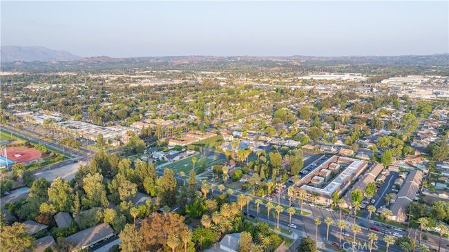 Bird’s-eye views show lot depth, neighborhood proximity, and scale of both main and guest structures. | Image 55