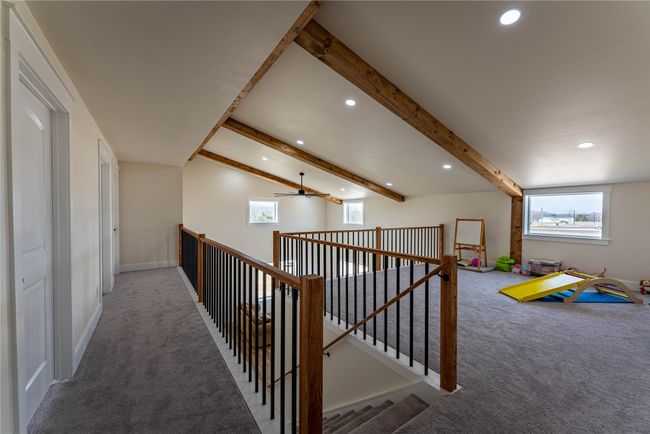 Corridor with carpet, beamed ceiling, an upstairs landing, and recessed lighting | Image 14