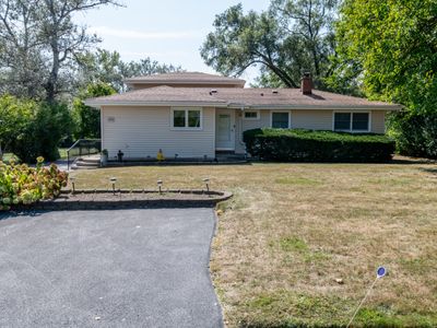 This well-maintained home offers 5 bedrooms and 2. | Image 2