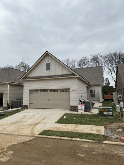 Unit 204 under construction - 2 car garage. | Image 3