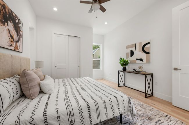 Bedroom featuring wood finished floors, baseboards, a closet, recessed lighting, and ceiling fan | Image 14
