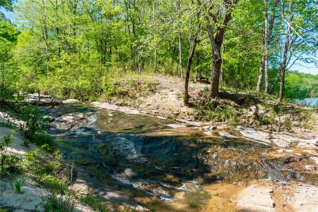 Community walking trail a short walk from subject property | Image 20