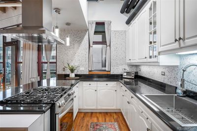 Newly renovated kitchen with new appliances and backsplash | Image 2