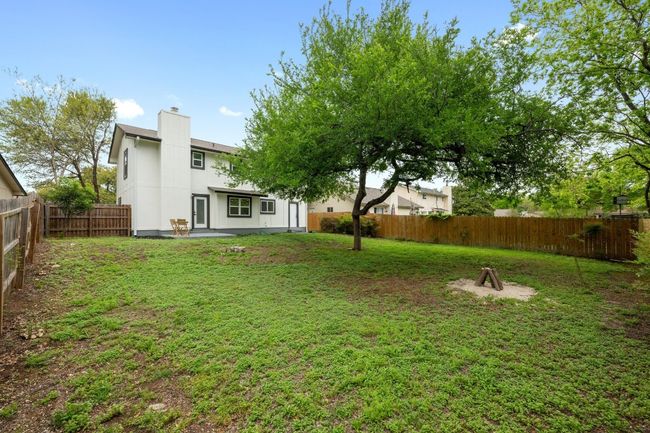 View of yard featuring a fenced backyard | Image 23