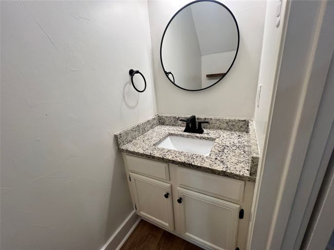 Bathroom with vanity and wood finished floors | Image 6