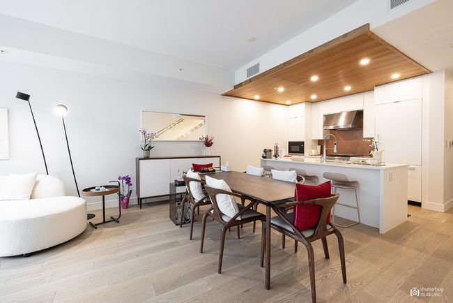 Dining space with light wood-style floors, visible vents, and recessed lighting | Image 7