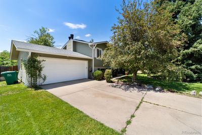 1553 S Tucson Street, House other with 4 bedrooms, 2 bathrooms and 2 parking in Aurora CO | Image 3