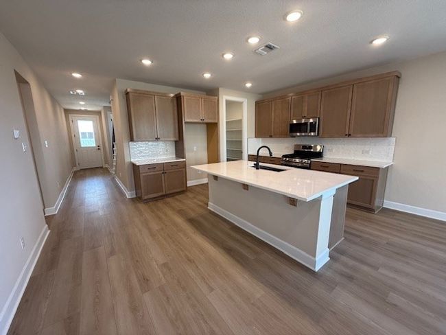 From Entry to Open Concept Kitchen with center island | Image 4