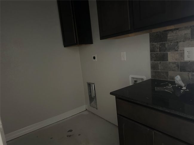 Laundry room with hookup for a washing machine and electric dryer hookup | Image 10
