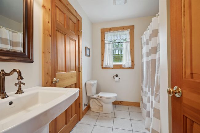 Laundy room off of bathroom | Image 12