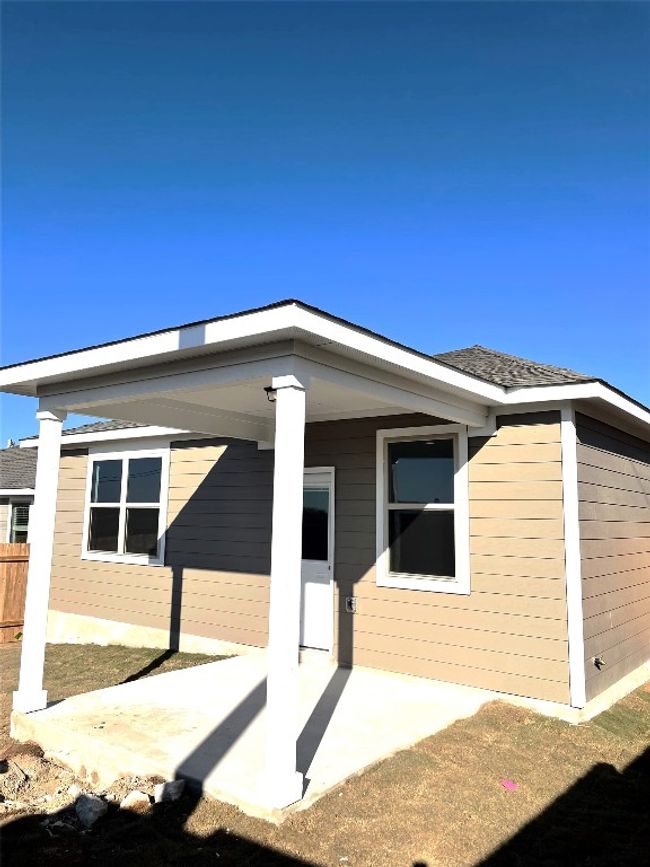 Rear view of house featuring a patio area | Image 22