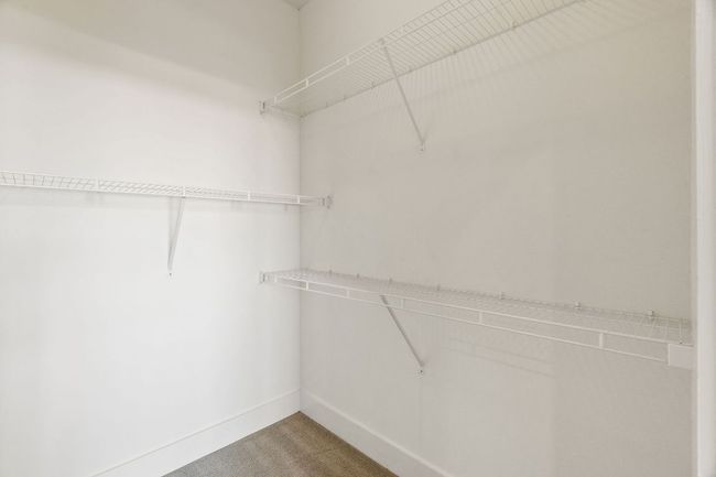 Walk in closet in the primary room. | Image 6