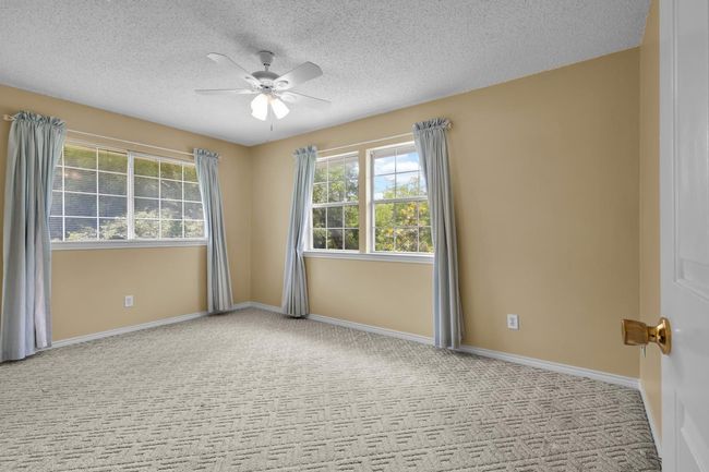 Second Floor, bedroom 3 with a ceiling fan, a textured ceiling, and carpet floors | Image 20