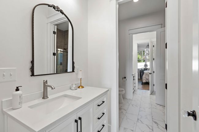 jack and jill bathroom. Each room has it's own vanity. | Image 31