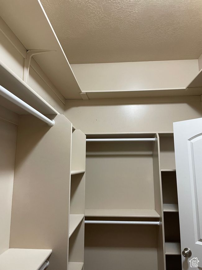 View of spacious closet | Image 25