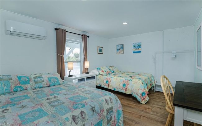 Bedroom on 1st level with 2 queen beds | Image 36