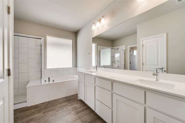 Primary Bathroom featuring vanity and independent shower and double sink | Image 18