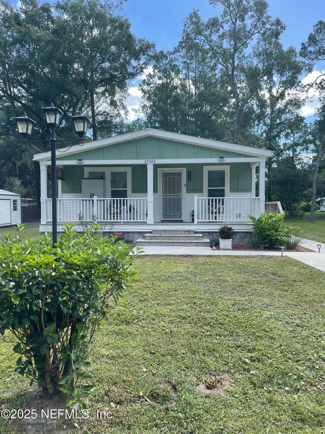 27303 New Front St, House other with 3 bedrooms, 2 bathrooms and null parking in Hilliard FL | Image 4
