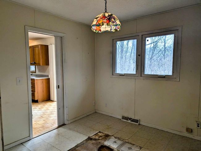 3rd main level bedroom - walk thru to kitchen | Image 14
