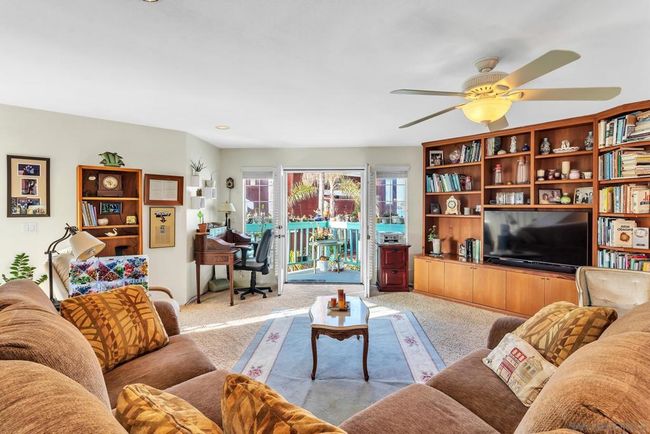2nd floor living room with sit down water views | Image 17
