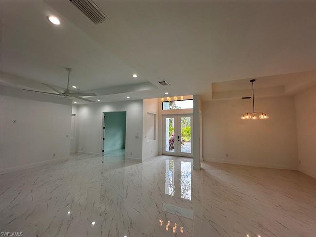 Entry, dining and living room view | Image 16