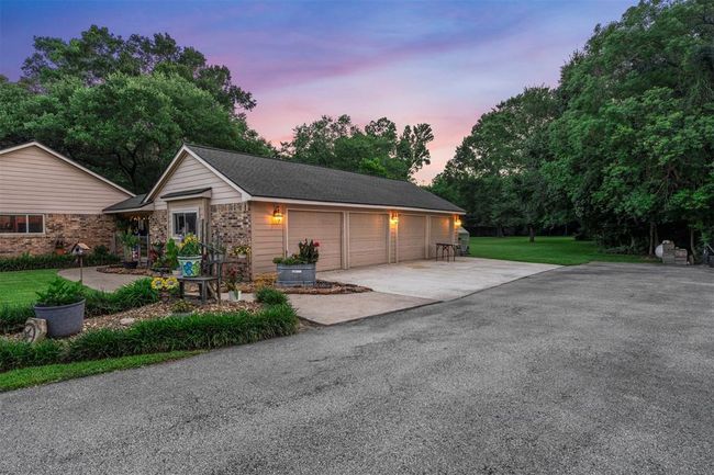 Who doesn't want a 4 car garage? Perfect for your cars, tractor and a work bench. | Image 31
