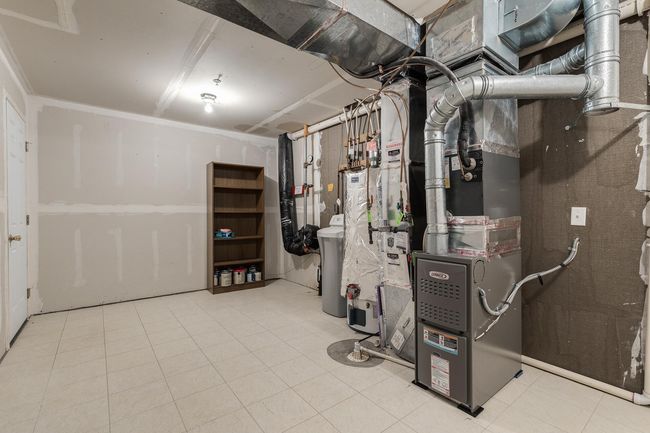 Brand new furnace 2025, Central Air 2001, siding and roof 2021. | Image 24