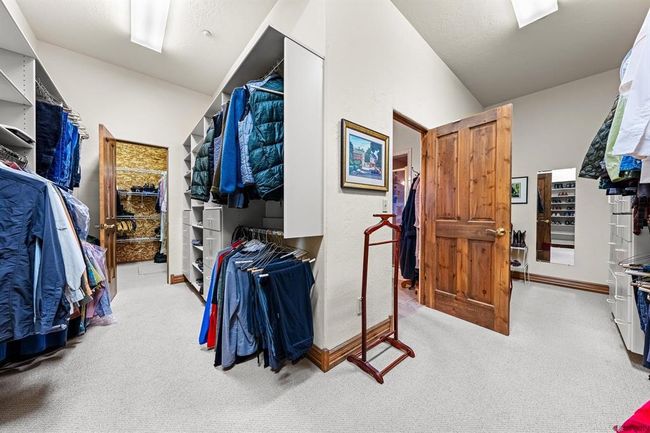 Large closet with custom built-ins and an additional cedar closet | Image 20