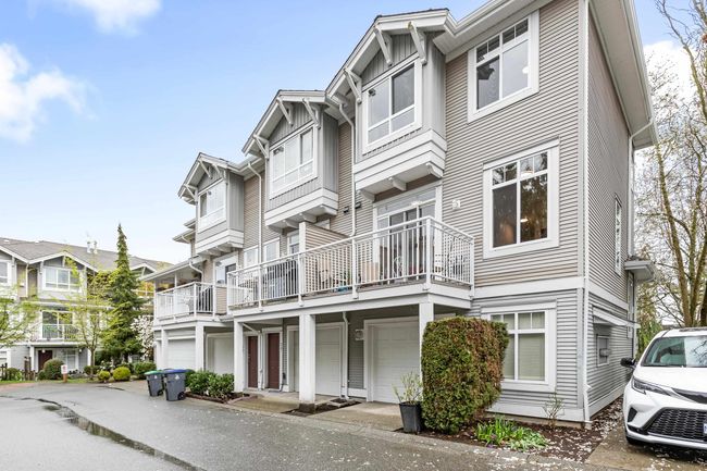 View of property featuring an attached garage | Image 28