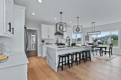 Each Stone Cottage floorplan highlights a wonderful open floorplan on the main level, perfect for hosting gatherings. *Previously Built Home* | Image 2