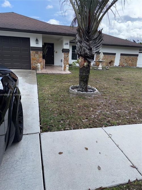 126 Sunflower Cir, Royal Palm Beach, FL, 33411-8009 | Card Image
